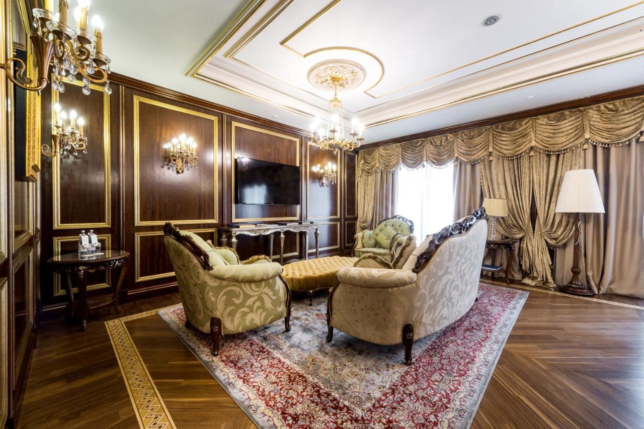 Hotel Rixos Khadisha Shymkent Exterior foto A living room in a luxury apartment