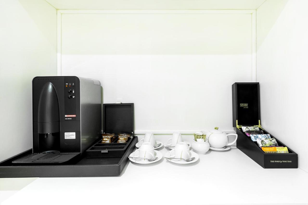 Hotel Rixos Khadisha Shymkent Exterior foto A coffee machine